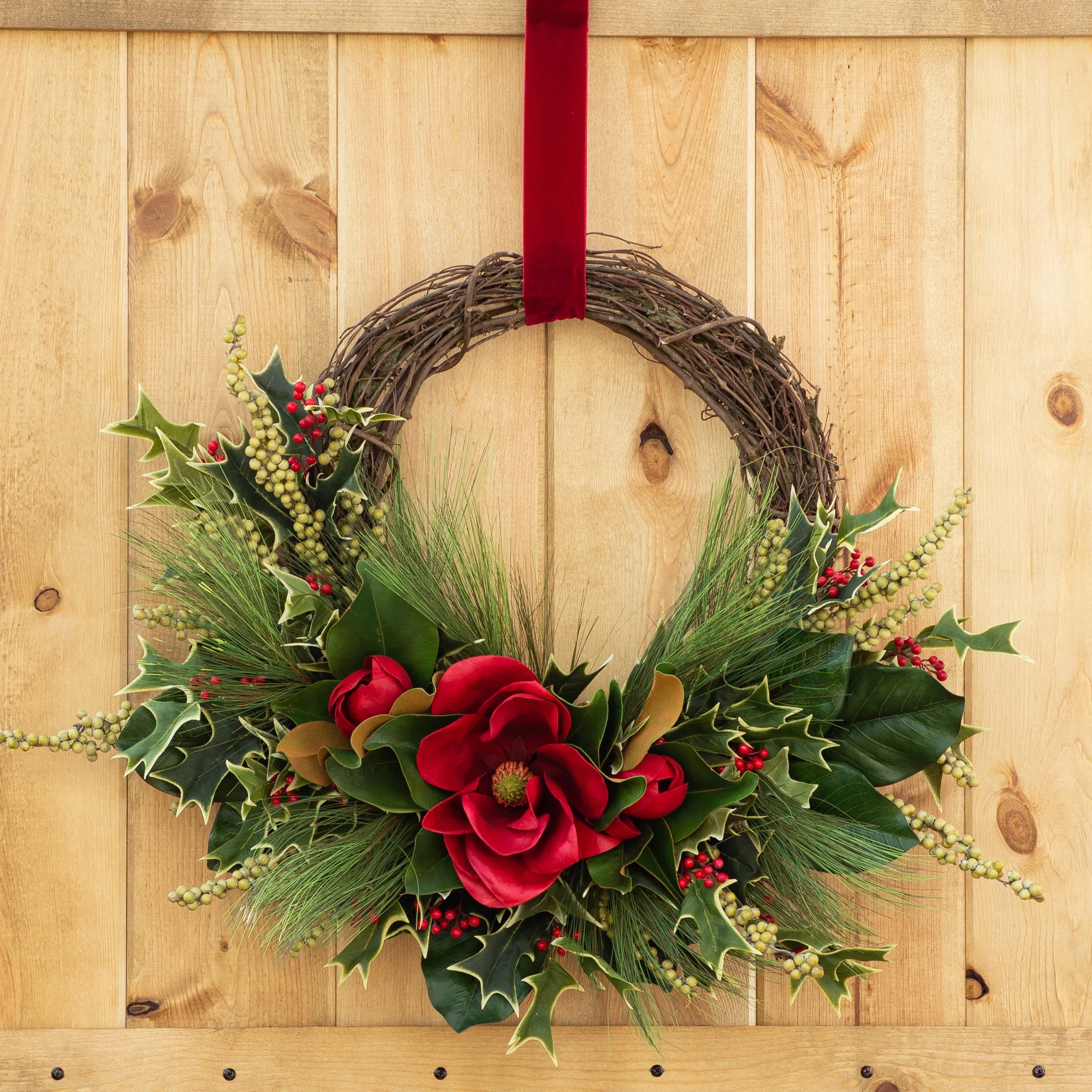 Classic Red Magnolia Blossom & Leaf Holiday Christmas Wreath with Holly, Long Needle Pine, Green Berries & Velvet Ribbon Hanger